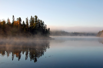 Image showing An autumn's landscape with fog