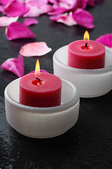 Image showing Candle and flower petal decoration.