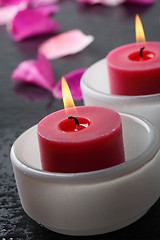 Image showing Candle and flower petal decoration.