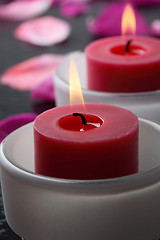 Image showing Candle and flower petal decoration.