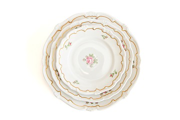 Image showing Stack of three white plates and saucers top view isolated
