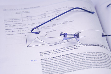 Image showing Glasses and the Statistics