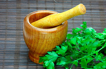 Image showing Old wooden mortar and pestle