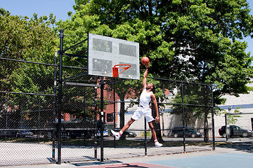 Image showing Jumping basketball player