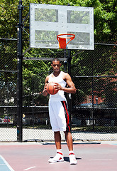 Image showing Basketball player with ball