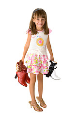 Image showing The girl and footwear