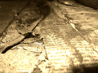 Image showing Grungy and burned newspaper