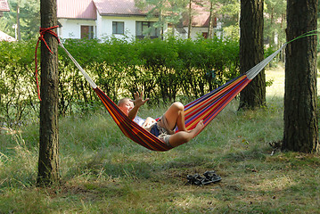 Image showing boy in a hammock