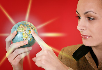 Image showing Globe in a girl's hands