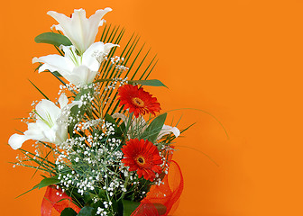 Image showing flower bouquet over orange