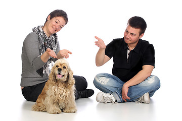 Image showing Girl, guy and american cocker spaniel 