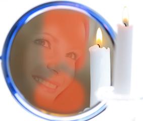 Image showing fortunetelling with mirror and candle