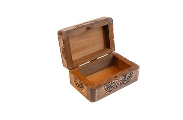 Image showing Open empty carved wooden casket isolated