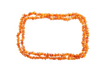 Image showing Amber beads double frame isolated