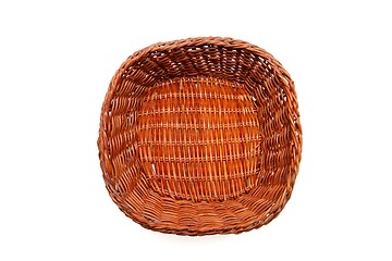 Image showing Brown wicker basket top view isolated