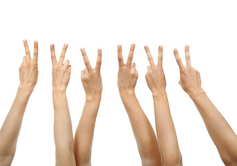 Image showing Hands showing victory sign