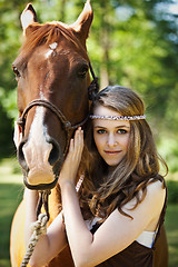 Image showing Girl with horse