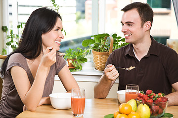 Image showing Couple eating breakfast