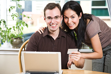 Image showing Happy couple shopping online