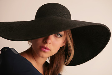 Image showing attractive young woman in hat