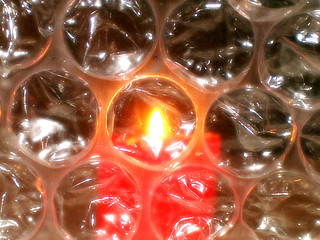 Image showing Romantic candle light over bubbles