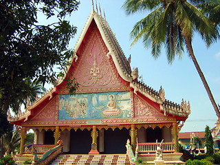 Image showing Palm trees and temples. Vientiane. Laos