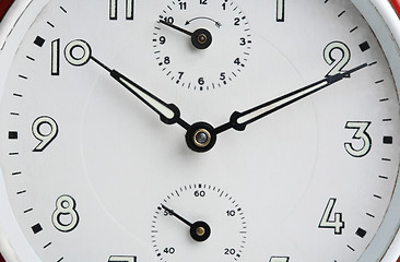 Image showing Close-up of old analog alarm clock face.