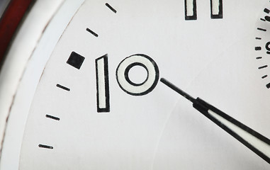 Image showing Close-up of old analog alarm clock face.