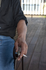 Image showing Hand Holding Cigarette