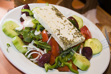 Image showing greek salad in taverna restaurant