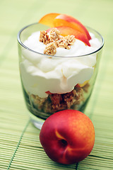 Image showing yogurt with muesli and fruit