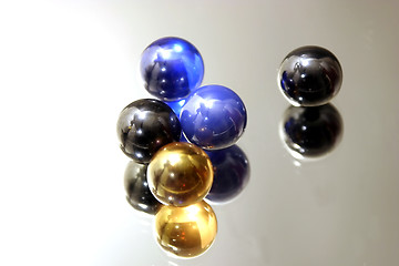 Image showing Marbles on Mirror