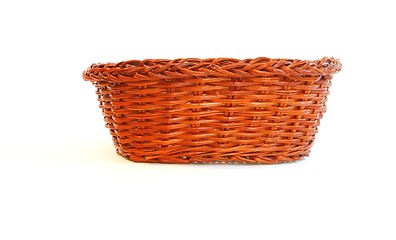 Image showing Orange wicker basket without handles side view isolated 