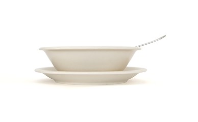 Image showing Plain beige soup plate with spoon and saucer side view isolated