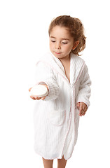 Image showing Beautiful girl holding a bar of soap