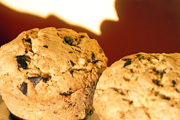 Image showing Chocolate and pine kernels muffin