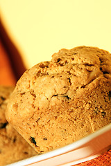 Image showing Chocolate and pine kernels muffin