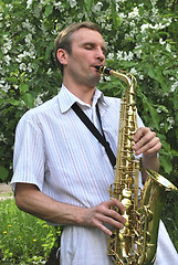 Image showing  man with saxophone