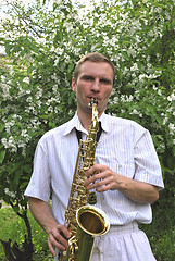 Image showing  man with saxophone