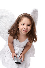 Image showing Smiling angel fairy with binoculars