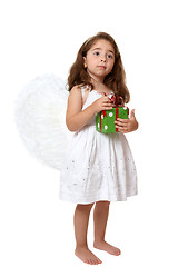 Image showing Angel child holding a present