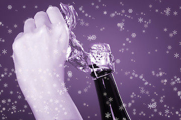 Image showing Opening champagne bottle