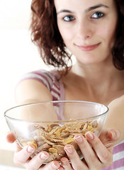 Image showing Young people eating milk with cereals