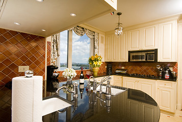 Image showing kitchen in city apartment with skyline views