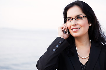 Image showing Hispanic businesswoman on the phone