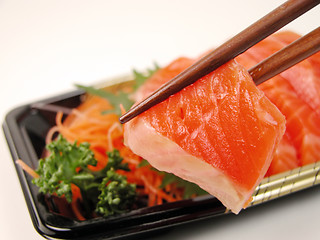 Image showing Sashimi and chopsticks