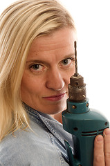 Image showing sexy contractor construction lady with tool