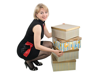 Image showing The woman with boxes