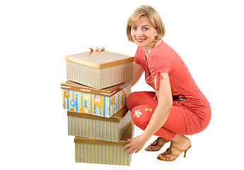 Image showing The woman with boxes