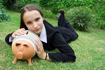 Image showing Girl with Piggy
